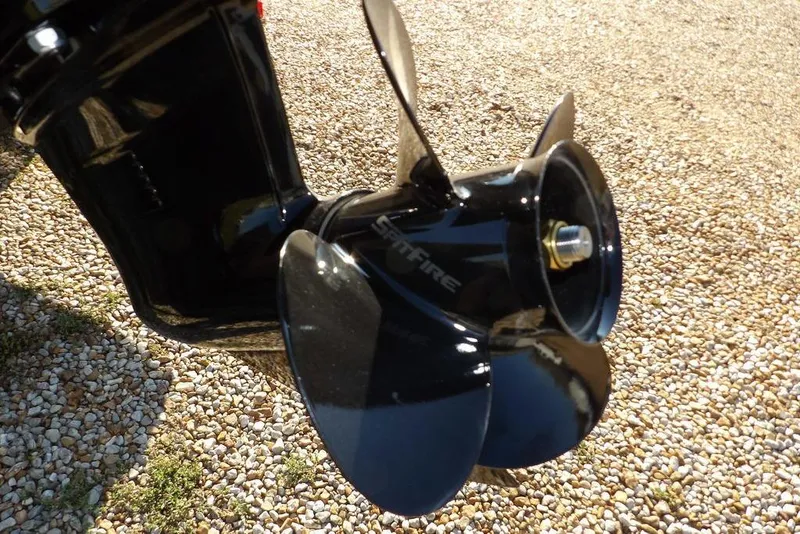 Slide: The Image of 2026 Crestliner XFC 189 boat propeller on gravel surface. - 44