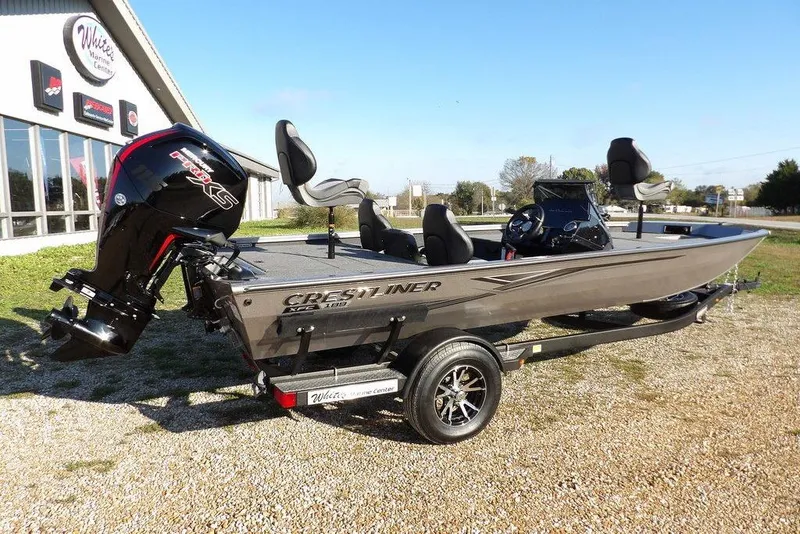 Slide: The Image of 2026 Crestliner XFC 189 fishing boat with powerful outboard motor on display. - 5
