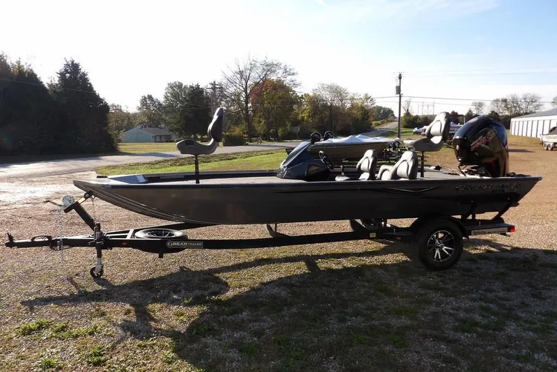 Slide: The Image of 2026 Crestliner XFC 189 fishing boat on trailer, parked outdoors. - 7