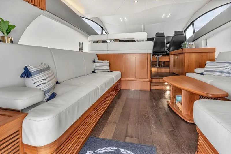 Slide: The Image of Luxurious interior of 2016 Sunseeker Manhattan 55 yacht with elegant seating and wooden accents. - 21