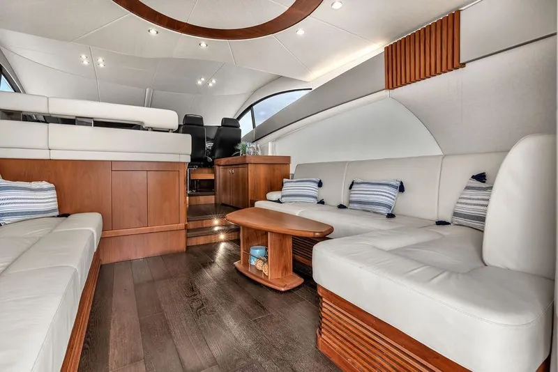 Slide: The Image of Luxurious interior of 2016 Sunseeker Manhattan 55 yacht with elegant seating and wooden accents. - 22