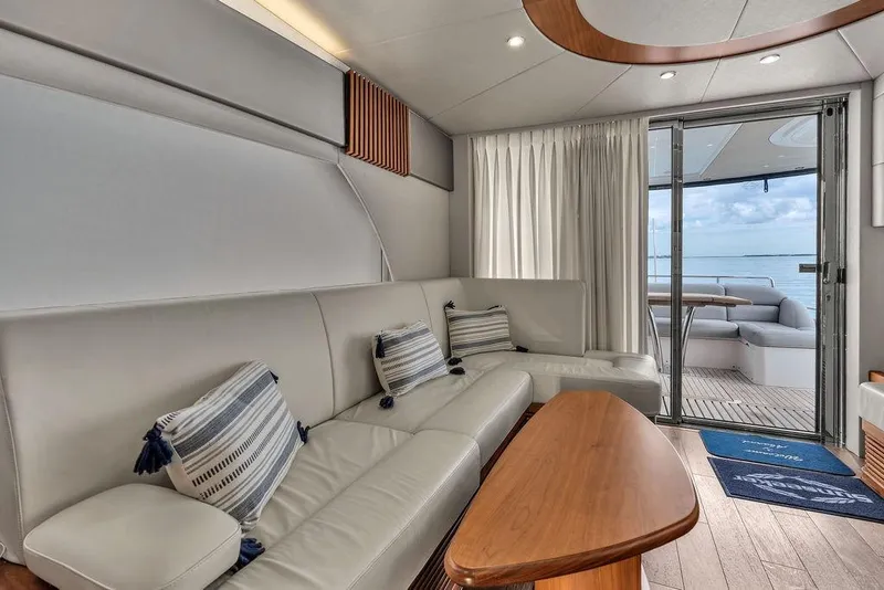 Slide: The Image of Luxurious interior of 2016 Sunseeker Manhattan 55 yacht with elegant seating and ocean view. - 24