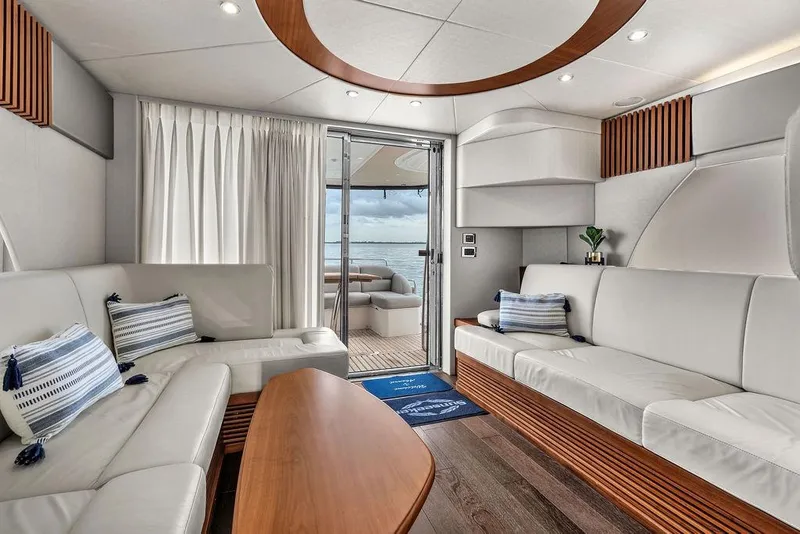 Slide: The Image of Luxurious interior of 2016 Sunseeker Manhattan 55 yacht with elegant seating and ocean view. - 26