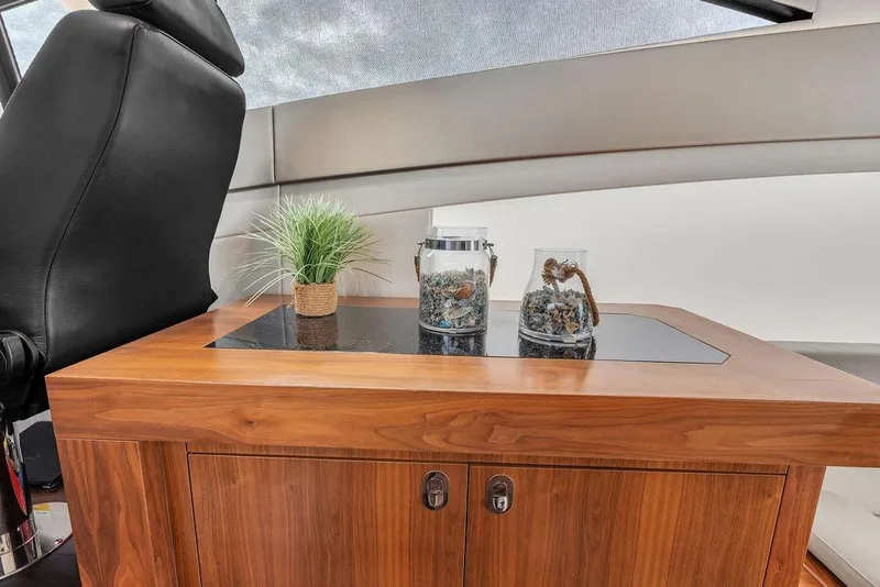Slide: The Image of Luxurious interior of 2016 Sunseeker Manhattan 55 yacht with elegant wooden cabinet. - 32