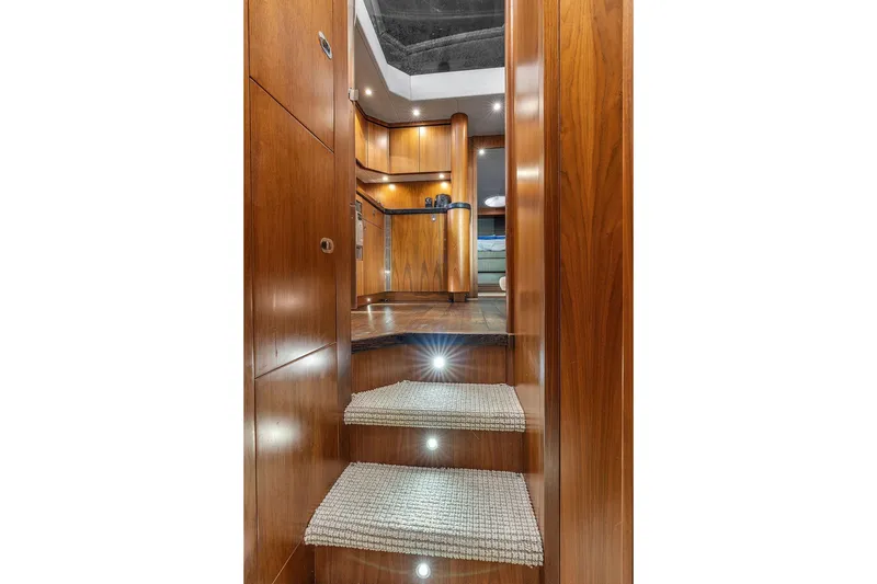 Slide: The Image of Luxurious interior of 2016 Sunseeker Manhattan 55 yacht with wooden finishes and carpeted steps. - 37