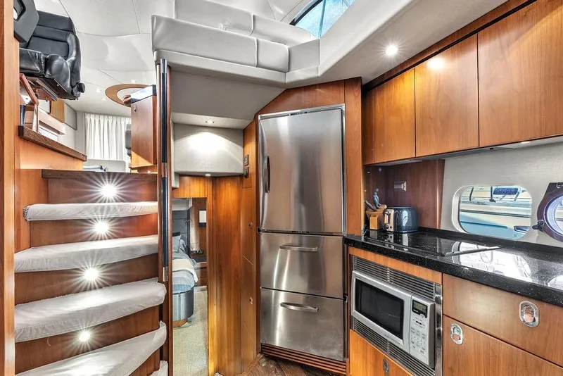 Slide: The Image of Luxurious interior of 2016 Sunseeker Manhattan 55 yacht with modern kitchen amenities. - 38