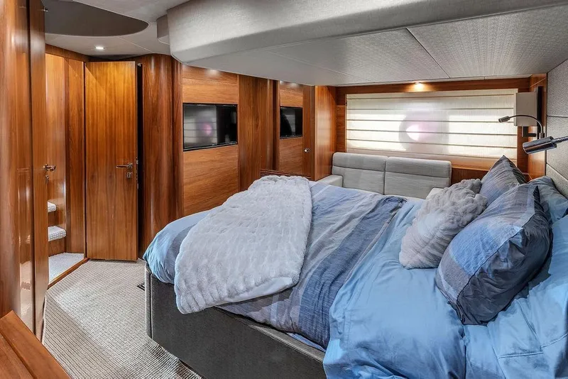 Slide: The Image of Luxurious bedroom interior of 2016 Sunseeker Manhattan 55 yacht with elegant wood finishes. - 44