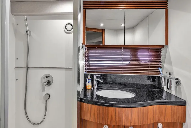 Slide: The Image of Luxurious bathroom in 2016 Sunseeker Manhattan 55 yacht with modern fixtures and elegant design. - 48