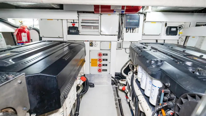 Slide: The Image of Engine room of 2016 Sunseeker Manhattan 55 yacht, featuring dual engines and control systems. - 80