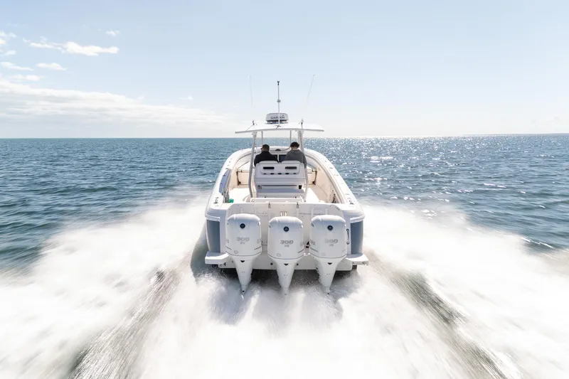 Slide: The Image of 2015 Intrepid 400 Center Console speeding on open ocean waters. - 11