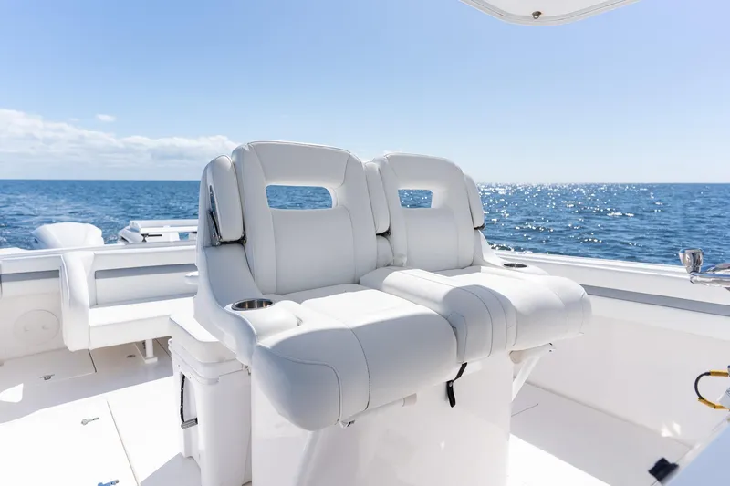 Slide: The Image of 2015 Intrepid 400 Center Console boat with white seating, ocean view. - 26