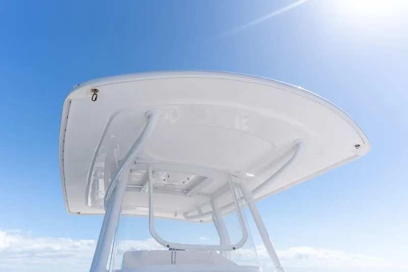 Slide: The Image of 2015 Intrepid 400 Center Console boat top against clear blue sky. - 29