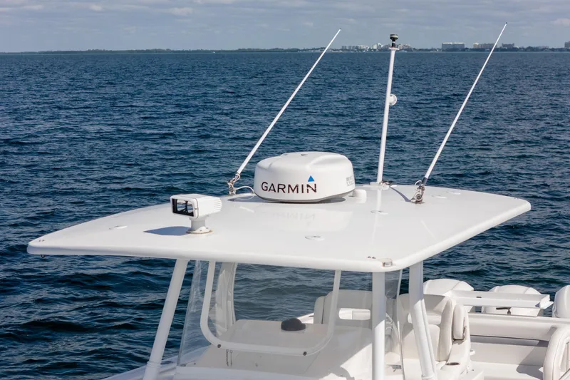 Slide: The Image of 2015 Intrepid 400 Center Console with Garmin radar on open sea. - 7
