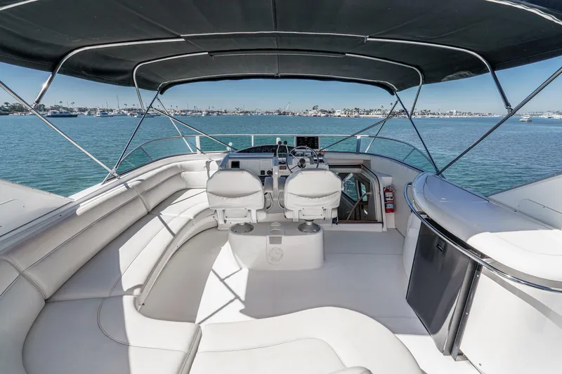 Slide: The Image of Luxurious 2000 Bayliner 5788 Pilot House Motoryacht interior with ocean view. - 11