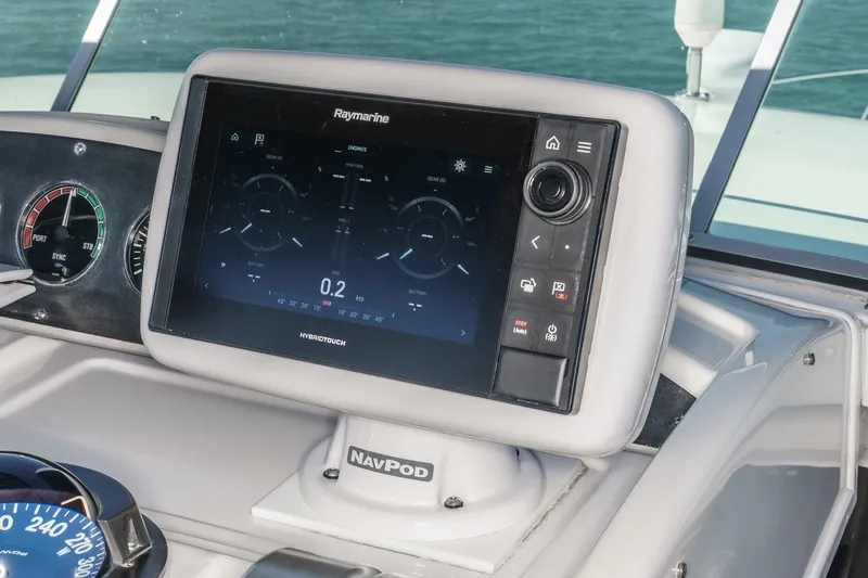 Slide: The Image of Raymarine navigation system on 2000 Bayliner 5788 Pilot House Motoryacht dashboard. - 15