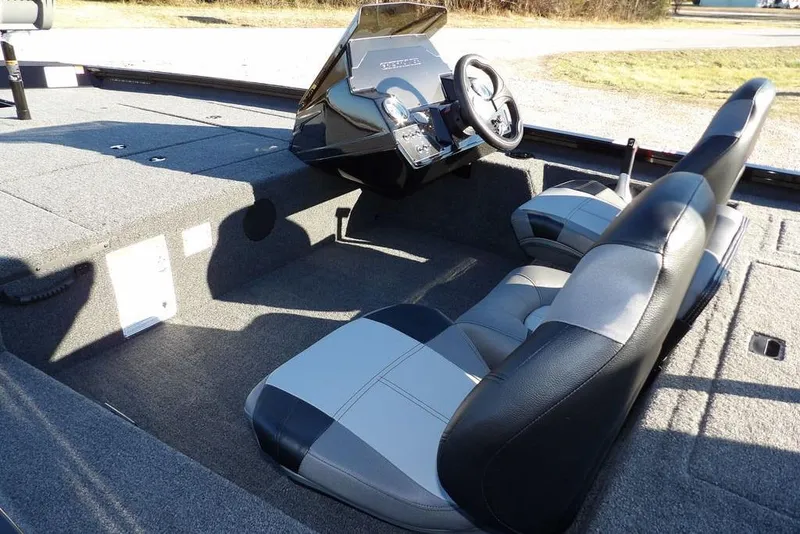 Slide: The Image of 2026 Crestliner XFC 189 boat interior with dual seats and steering console. - 11