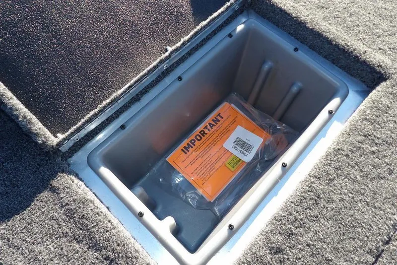 Slide: The Image of Storage compartment in 2026 Crestliner XFC 189 boat with important documents inside. - 18