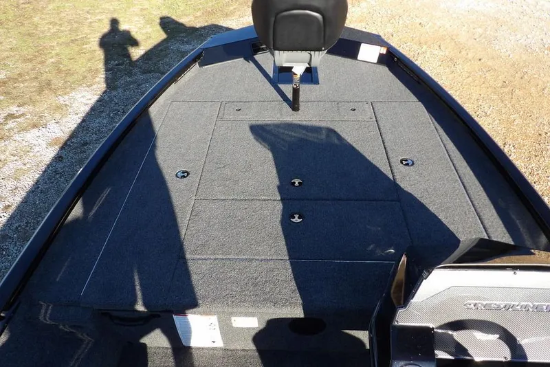 Slide: The Image of 2026 Crestliner XFC 189 boat deck with seating and storage compartments. - 23