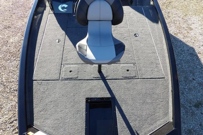 Slide: The Image of 2026 Crestliner XFC 189 boat deck with a single seat and carpeted surface. - 28