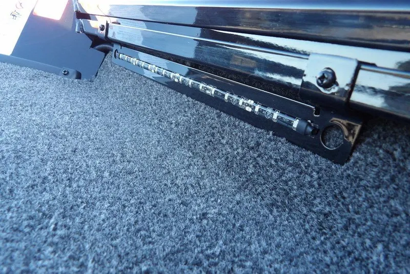 Slide: The Image of 2026 Crestliner XFC 189 interior detail with LED lighting and carpeted surface. - 30