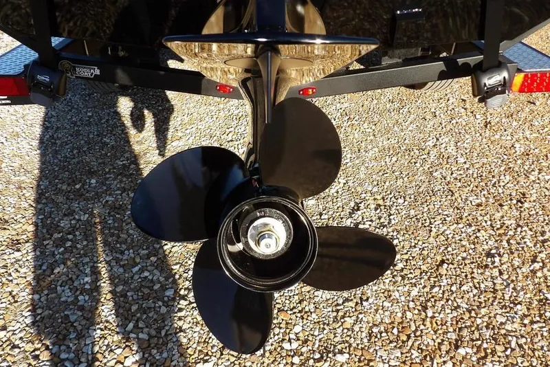 Slide: The Image of Propeller of 2026 Crestliner XFC 189 boat on gravel surface. - 32