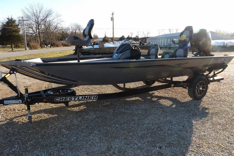 Slide: The Image of 2026 Crestliner XFC 189 boat on trailer outdoors. - 2