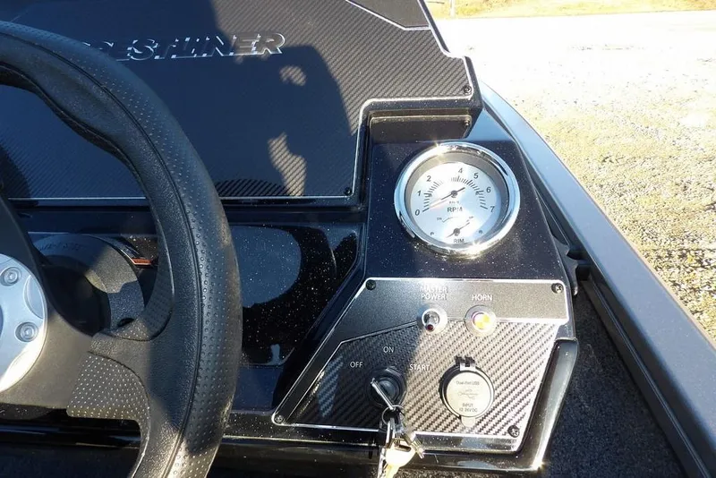 Slide: The Image of Crestliner XFC 189 2026 boat hatch with storage space. - 24