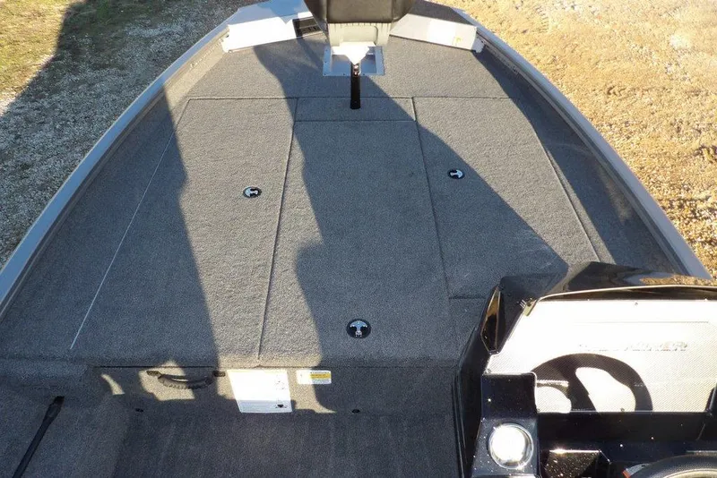 Slide: The Image of Crestliner XFC 189 2026 boat storage compartment with accessories. - 26