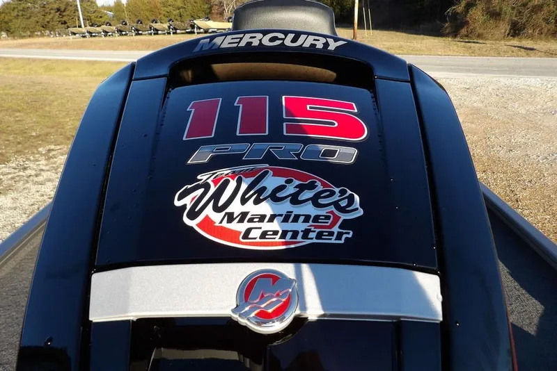 Slide: The Image of Crestliner XFC 189 2026 boat with gray carpet and seat. - 29