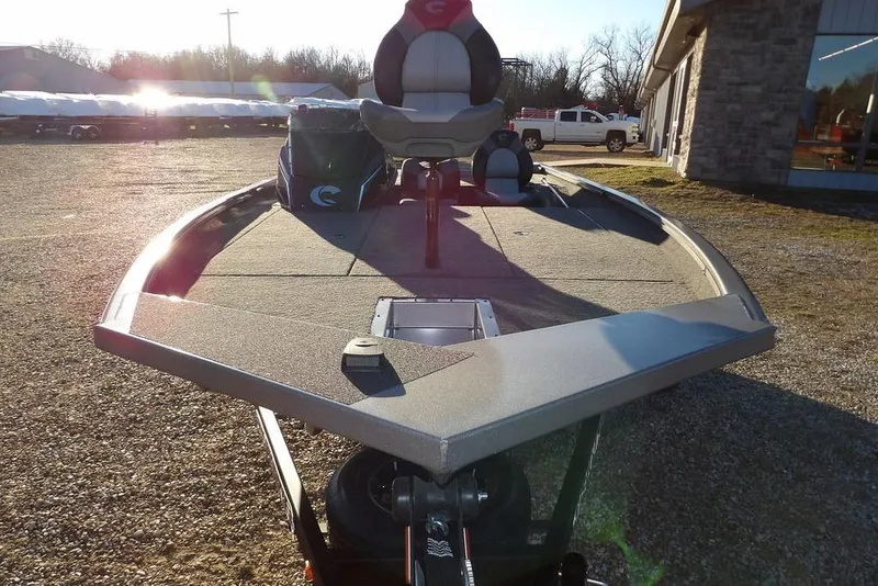 Slide: The Image of 2026 Crestliner XFC 189 boat on a sunny parking lot. - 3