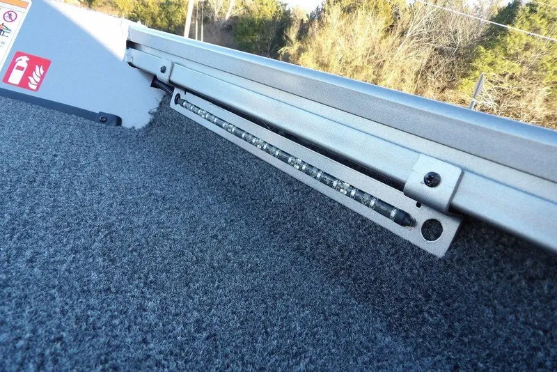 Slide: The Image of Crestliner XFC 189 boat 2026 on trailer, close-up view. - 38