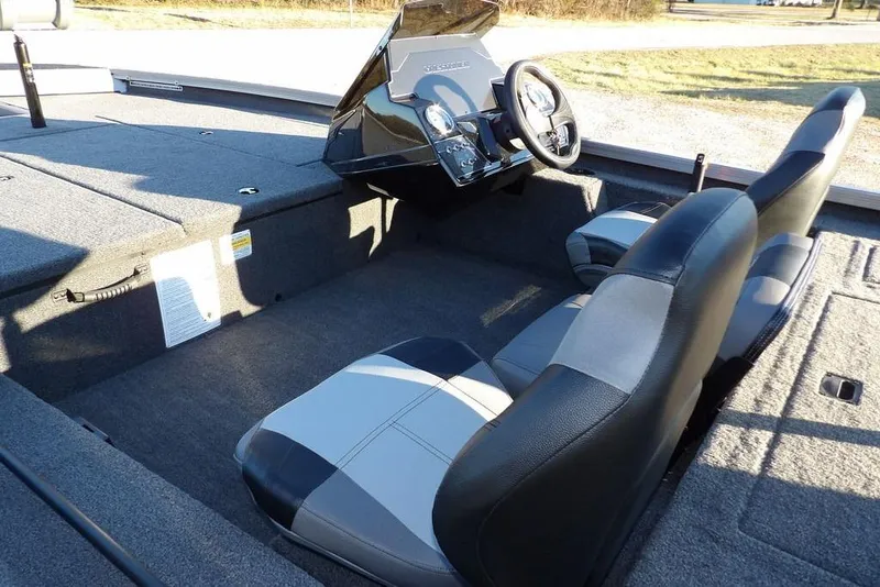 Slide: The Image of 2026 Crestliner XFC 189 boat with outboard motor on trailer. - 7