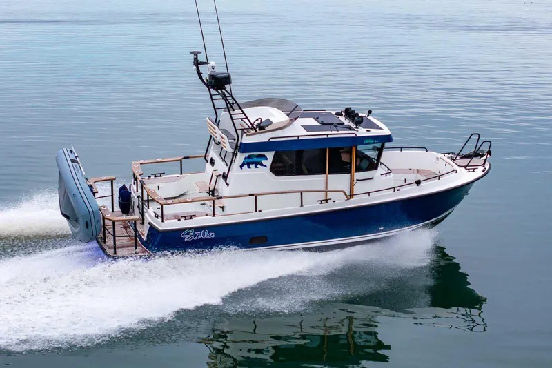 The Image of 2024 Targa 27.2 boat cruising on calm water, showcasing sleek design and powerful engine. - 0