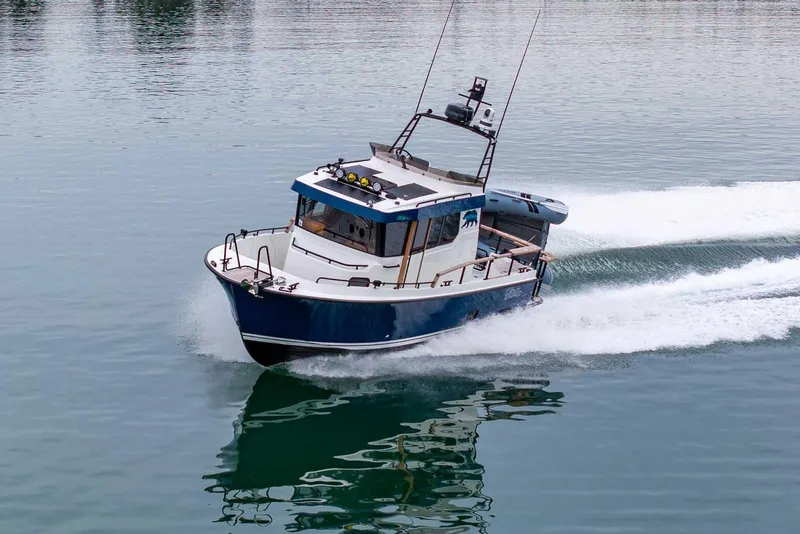 Slide: The Image of 2024 Targa 27.2 boat cruising on calm water, showcasing sleek design and performance. - 3