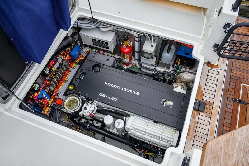 Slide: The Image of Engine compartment of 2024 Targa 27.2 boat featuring Volvo Penta D6-440 engine. - 34