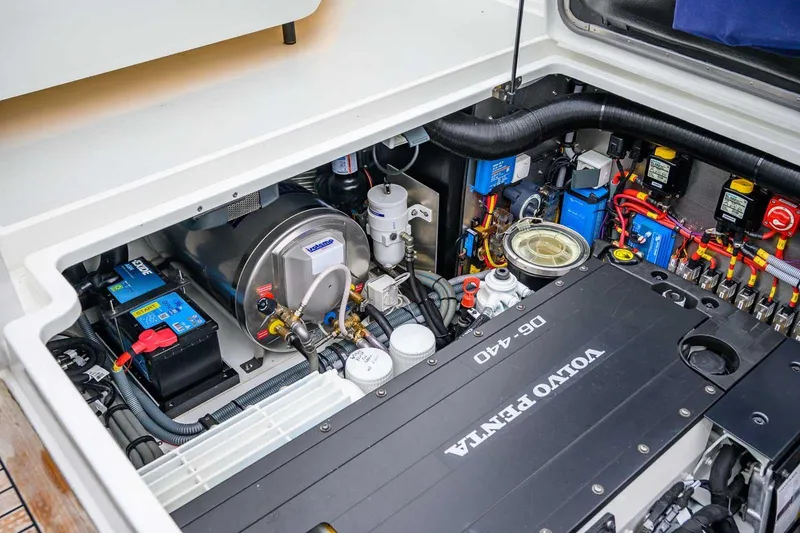 Slide: The Image of Engine compartment of 2024 Targa 27.2 boat featuring Volvo Penta D6-440 engine. - 37