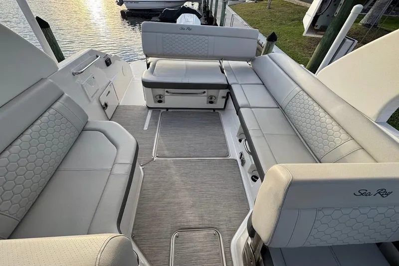 Slide: The Image of 2020 Sea Ray SDX 250 Outboard boat on lift at dockside marina. - 18