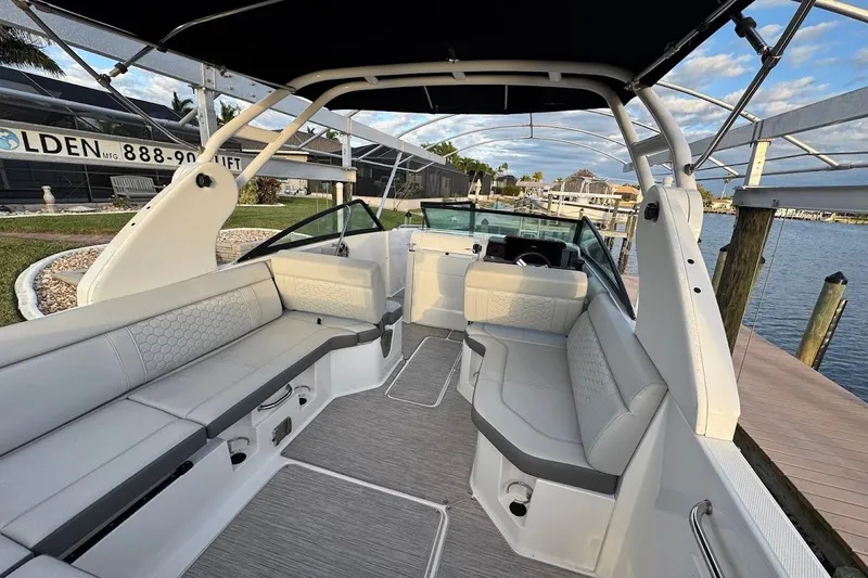 Slide: The Image of 2020 Sea Ray SDX 250 Outboard boat interior with spacious seating and modern design. - 36