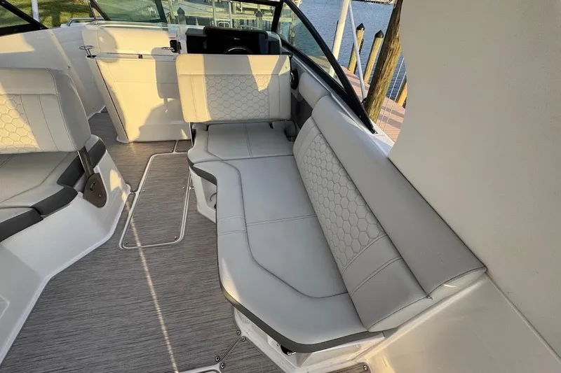 Slide: The Image of 2020 Sea Ray SDX 250 Outboard interior with elegant seating and modern design. - 38