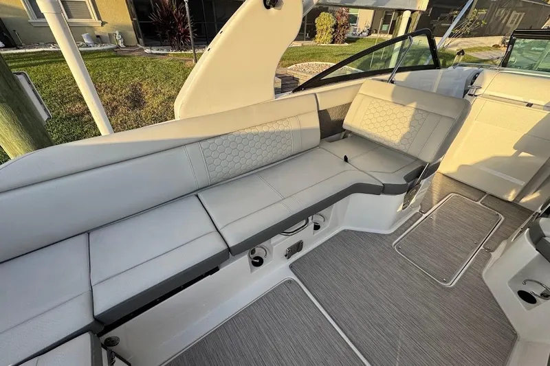 Slide: The Image of 2020 Sea Ray SDX 250 Outboard interior with spacious seating and modern design. - 39