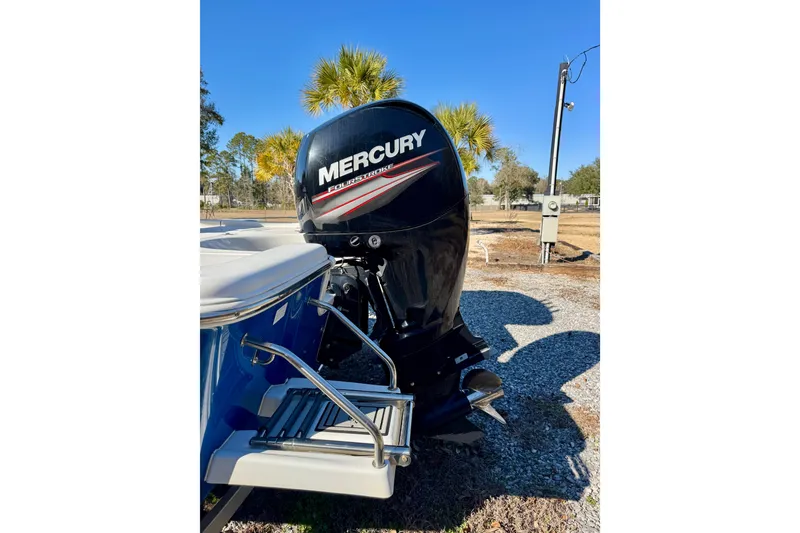 Slide: The Image of 2018 Sea Pro 208 Bay boat with Mercury FourStroke engine, parked outdoors. - 4