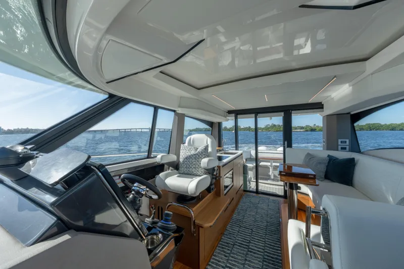 Slide: The Image of Luxurious interior of 2025 Tiara Yachts 43 LE, featuring modern helm and seating. - 17