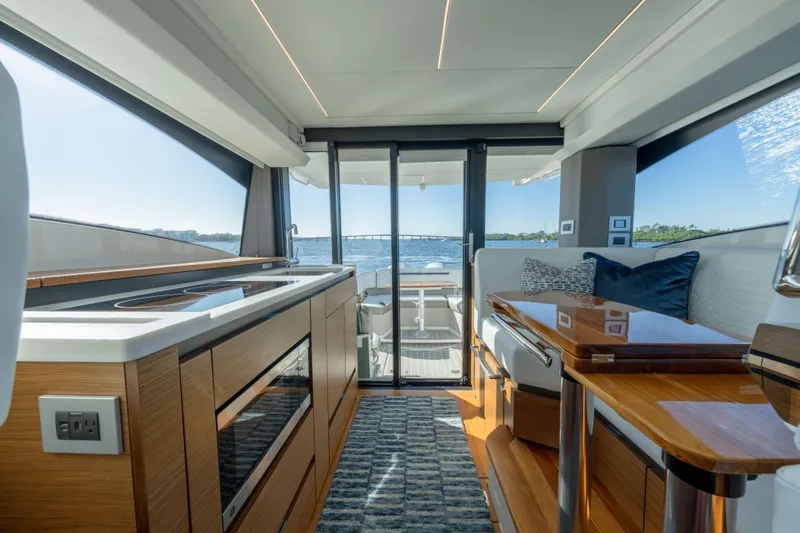 Slide: The Image of Luxurious interior of 2025 Tiara Yachts 43 LE with modern design and scenic view. - 26