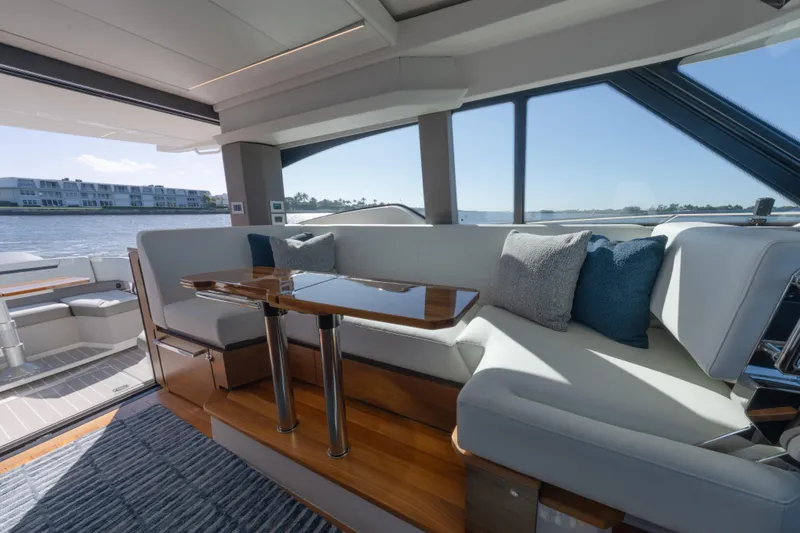 Slide: The Image of Luxurious interior of 2025 Tiara Yachts 43 LE with elegant seating and scenic views. - 28