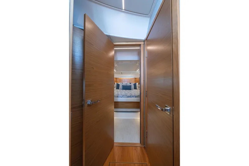 Slide: The Image of Interior view of 2025 Tiara Yachts 43 LE, featuring a luxurious bedroom. - 30