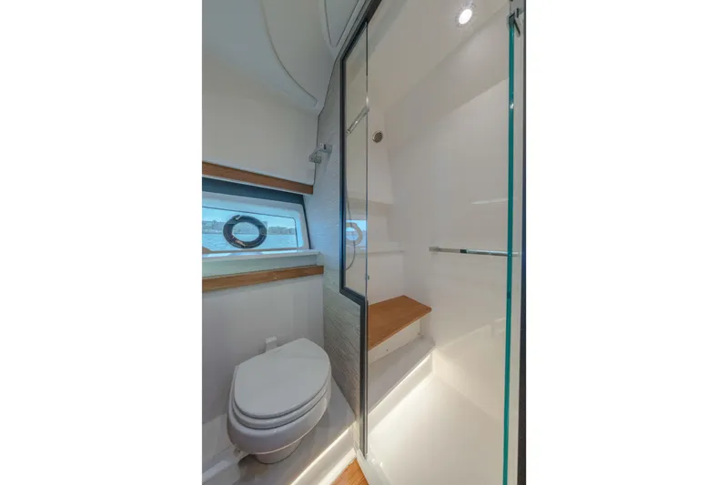 Slide: The Image of Modern bathroom in 2025 Tiara Yachts 43 LE, featuring sleek design and glass shower. - 38