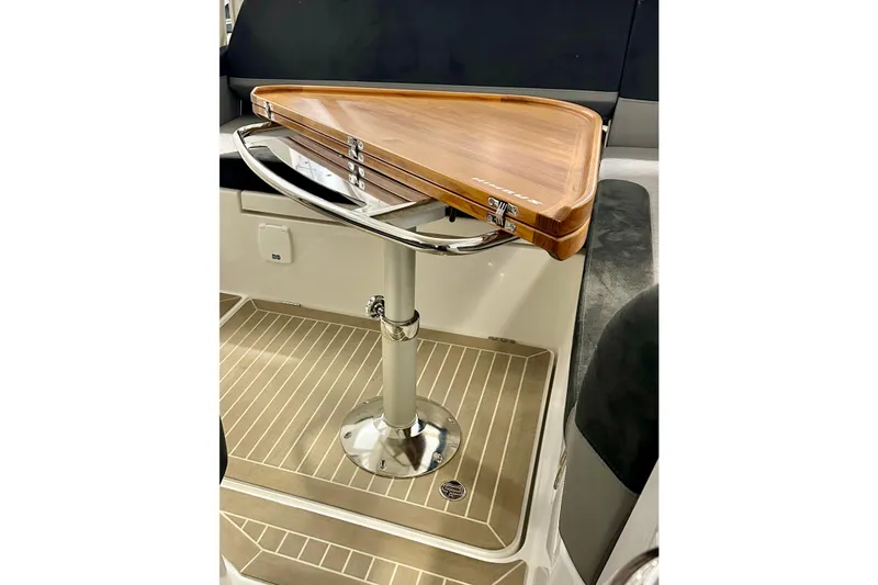 Slide: The Image of 2023 Nimbus Weekender 9 interior with elegant wooden table and sleek design. - 27