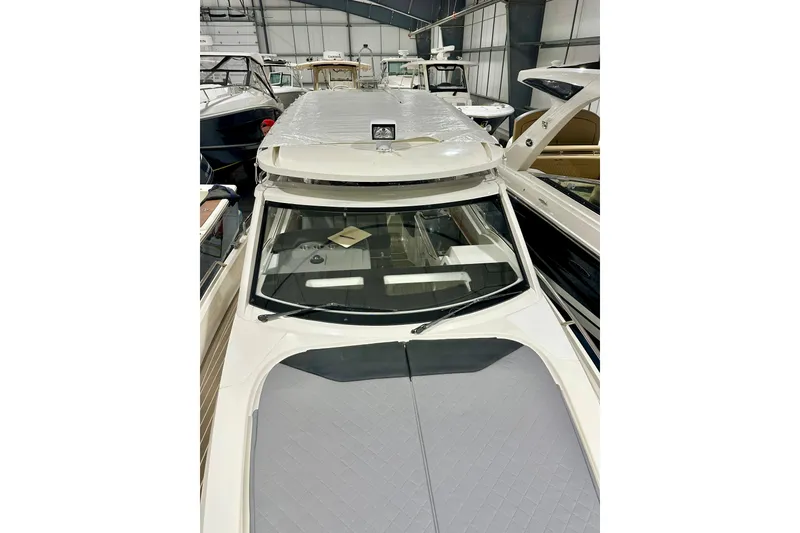 Slide: The Image of 2023 Nimbus Weekender 9 boat in showroom, featuring sleek design and modern amenities. - 44