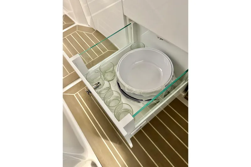 Slide: The Image of Open drawer with dishes and glasses on Nimbus Weekender 9, 2023 model. - 23