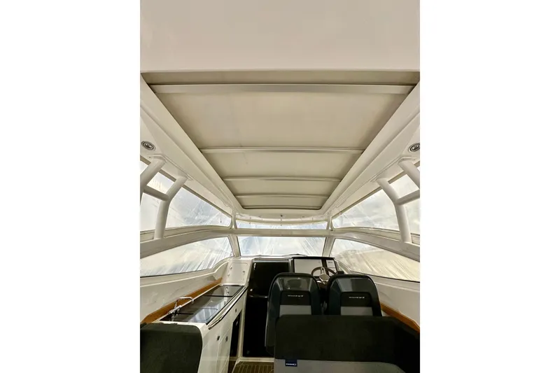 Slide: The Image of Interior view of 2023 Nimbus Weekender 9 boat, featuring sleek design and modern seating. - 45